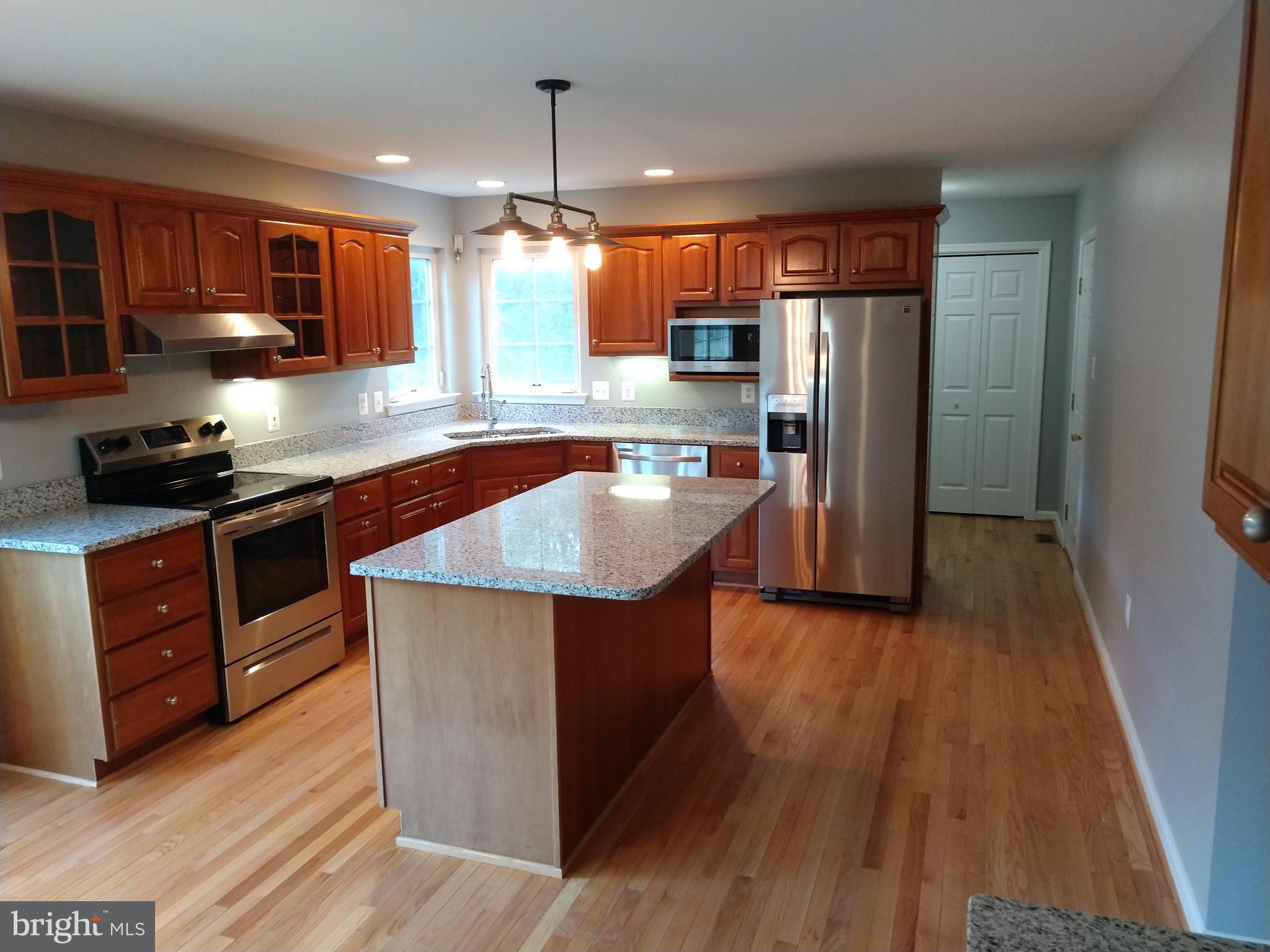 New lighting.  Hardwood throughout main floor.