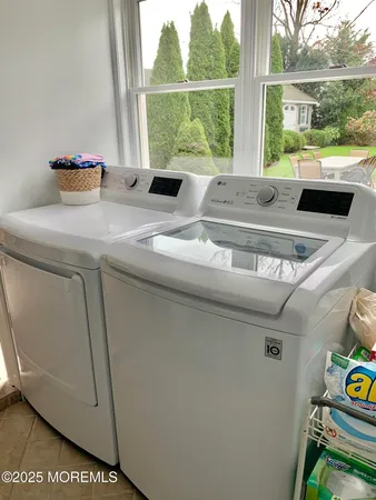 a view of washer and dryer sitting on a table