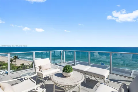 a group of chairs sitting in a outdoor space