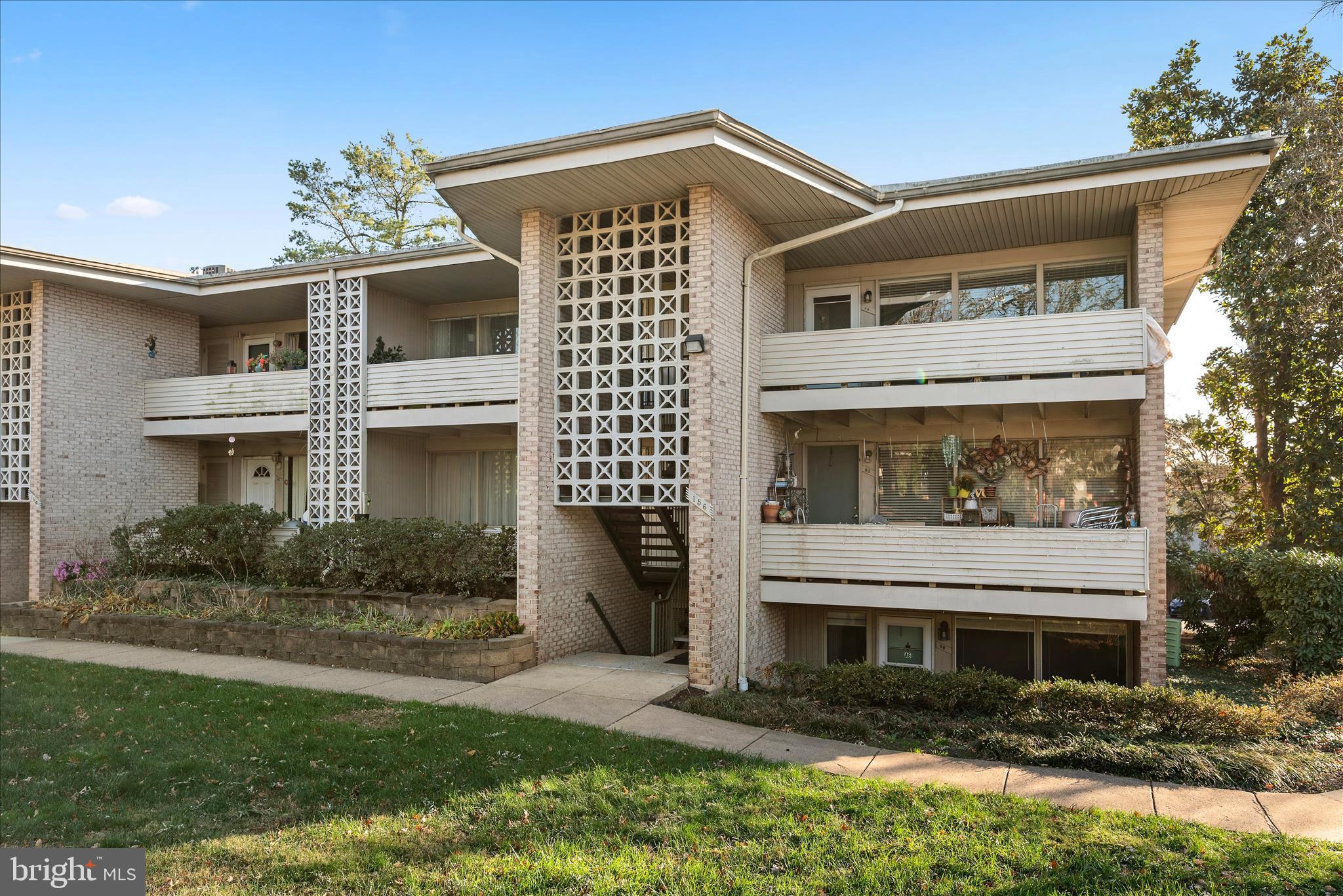 156 Haycock Road, Unit A6 Falls Church, VA 22046 - Photo 11 of 30 a front view of a house with a yard