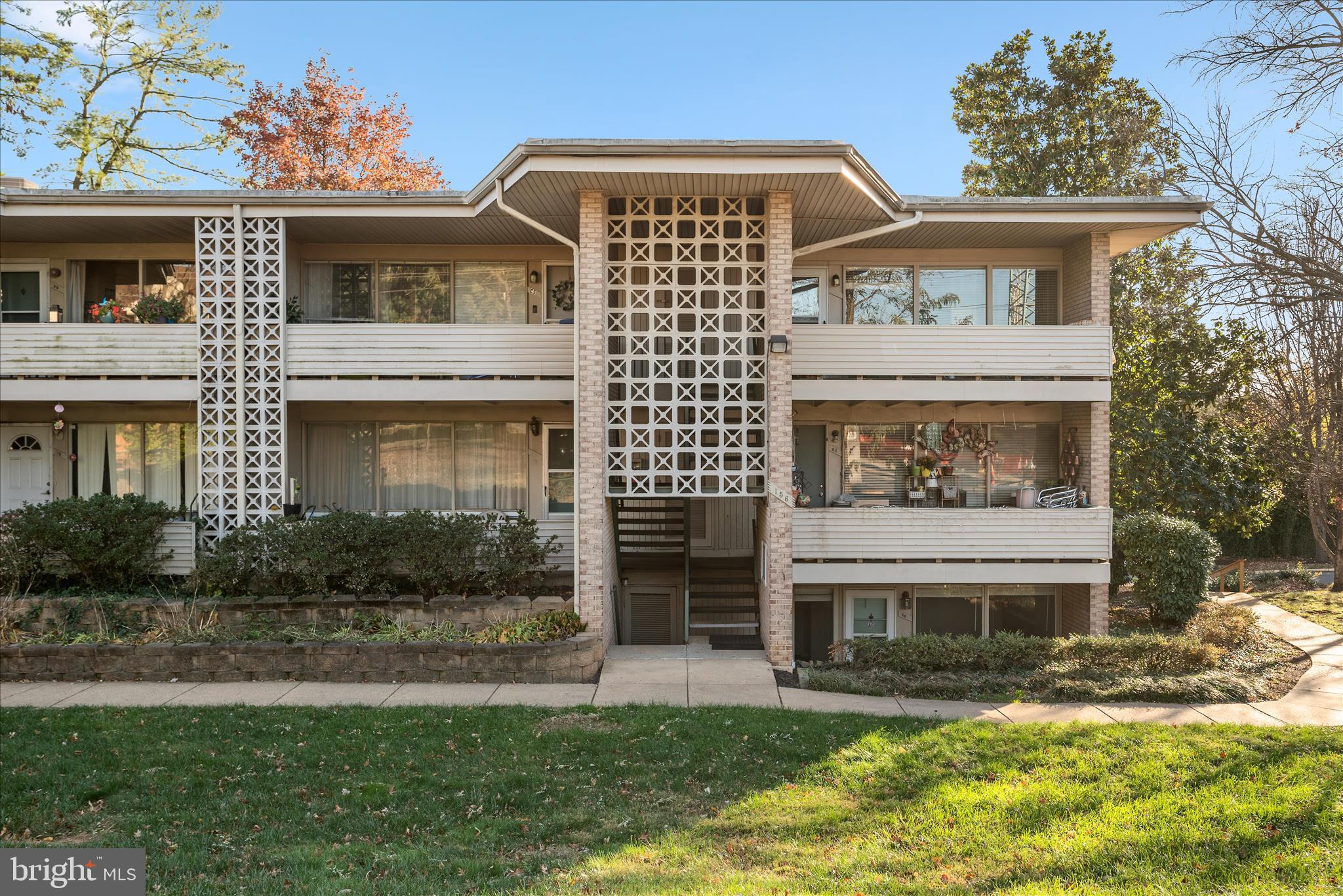 156 Haycock Road, Unit A6 Falls Church, VA 22046 - Photo 8 of 30 a front view of a house with garden