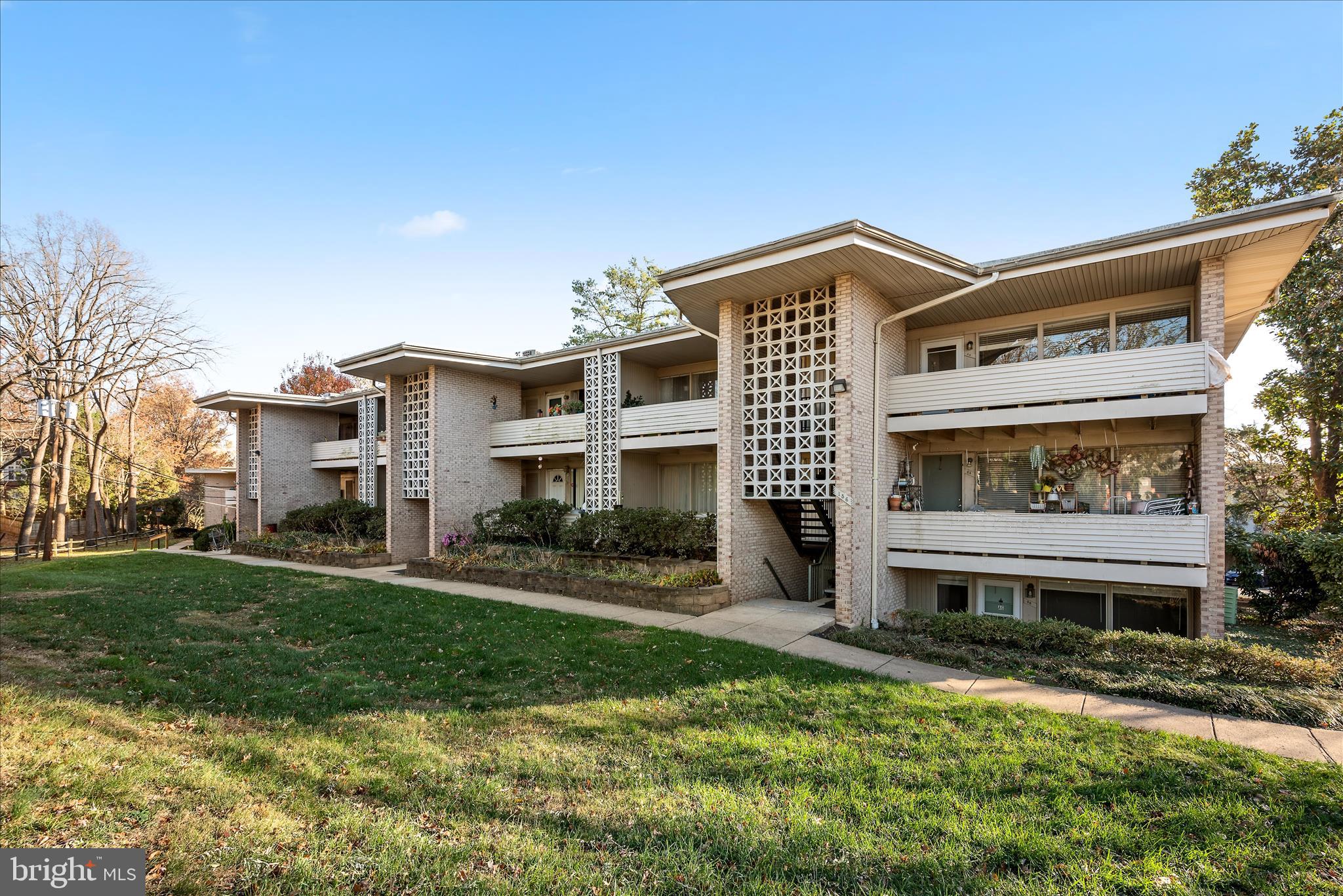 156 Haycock Road, Unit A6 Falls Church, VA 22046 - Photo 10 of 30 a view of a house with a yard