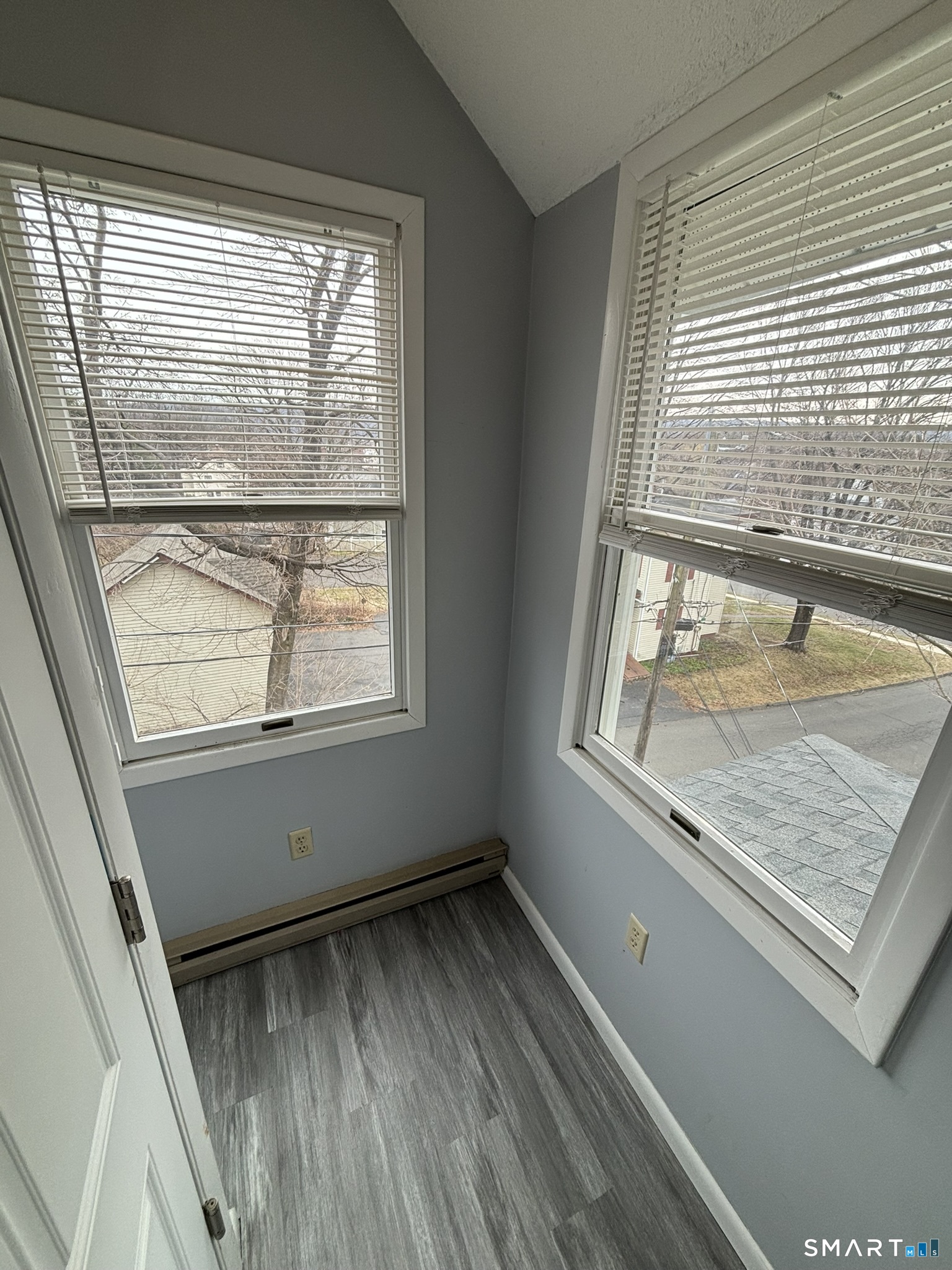 11 Roberts Street, Unit 3 Bristol, CT 06010 - Photo 3 of 11 a view of an empty room and window