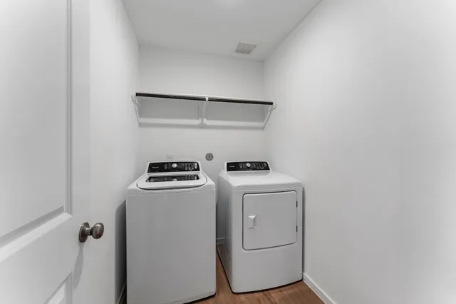 a utility room with dryer and washer