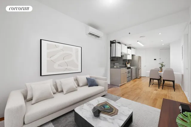 a living room with furniture and a table