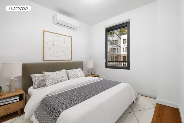 a kitchen with refrigerator and chairs