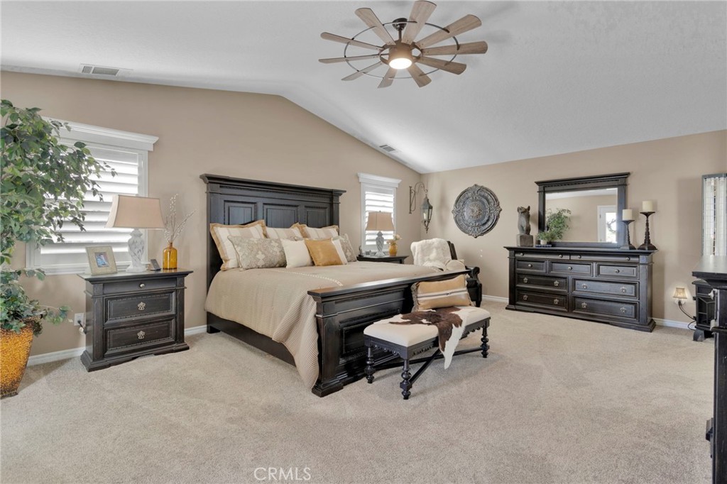 2909 Silver Ridge Drive Pinon Hills, CA 92372 - Photo 19 of 55 a bedroom with a bed dresser and a window