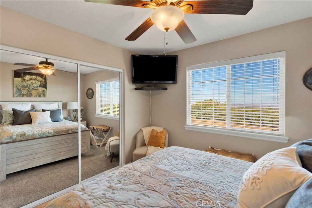 2909 Silver Ridge Drive Pinon Hills, CA 92372 - Photo 26 of 55 a bedroom with a bed and tv