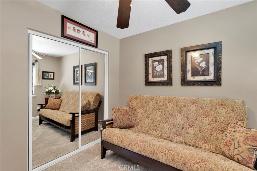 2909 Silver Ridge Drive Pinon Hills, CA 92372 - Photo 30 of 55 a living room with furniture and painting on the wall