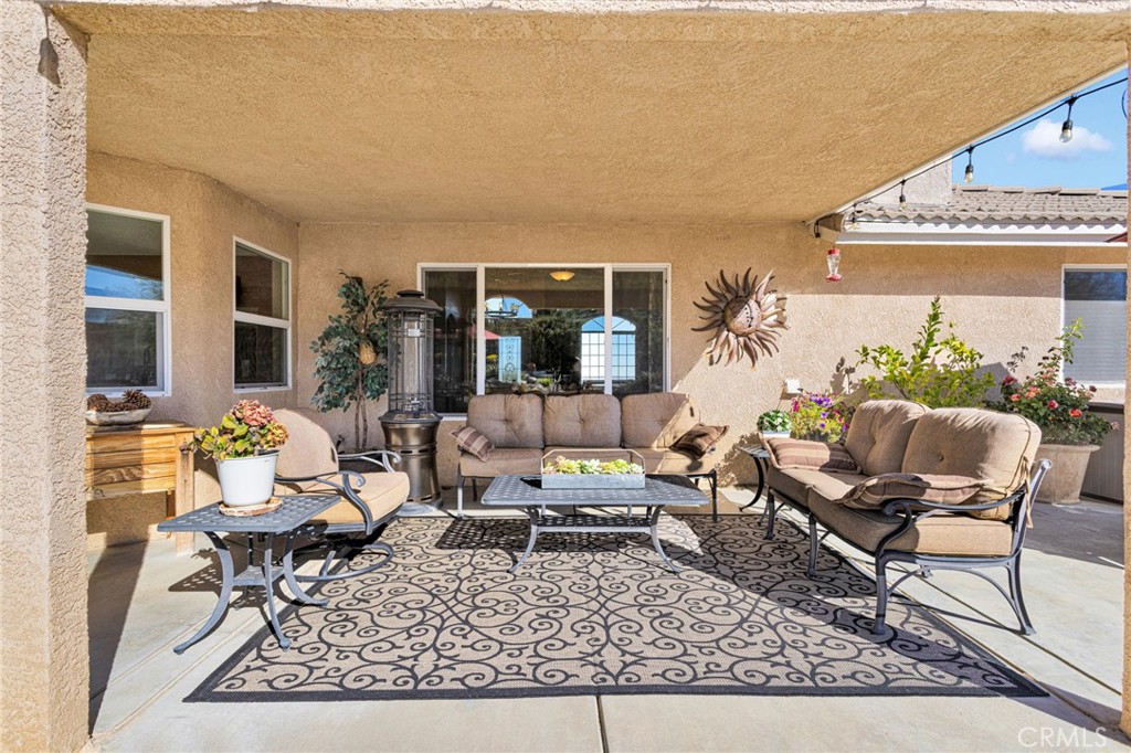 2909 Silver Ridge Drive Pinon Hills, CA 92372 - Photo 34 of 55 a living room with furniture and a rug