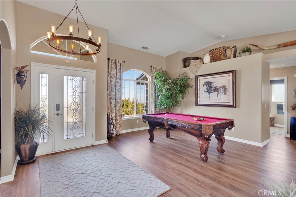 2909 Silver Ridge Drive Pinon Hills, CA 92372 - Photo 5 of 55 a living room with furniture a window and wooden floor
