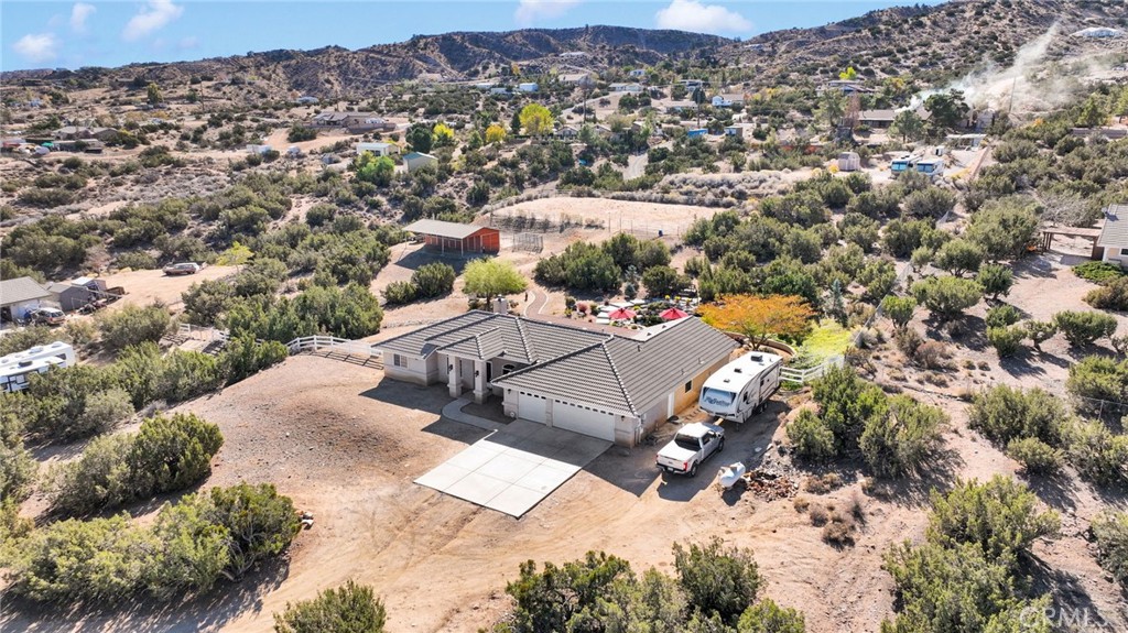 2909 Silver Ridge Drive Pinon Hills, CA 92372 - Photo 55 of 55 an aerial view of a house with a yard