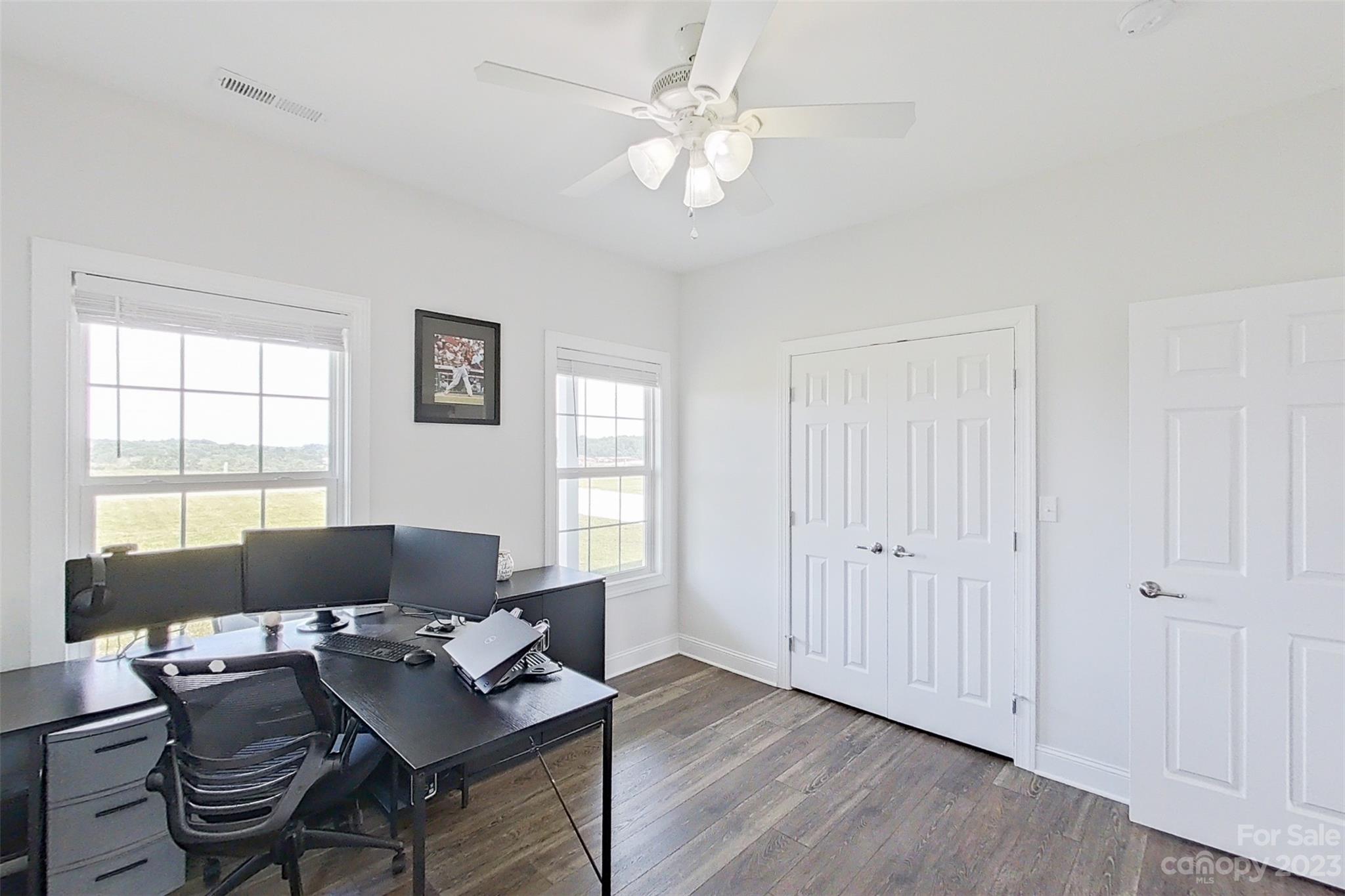 345 Rash Road Olin, NC 28660 - Photo 26 of 39 a workspace with furniture and window