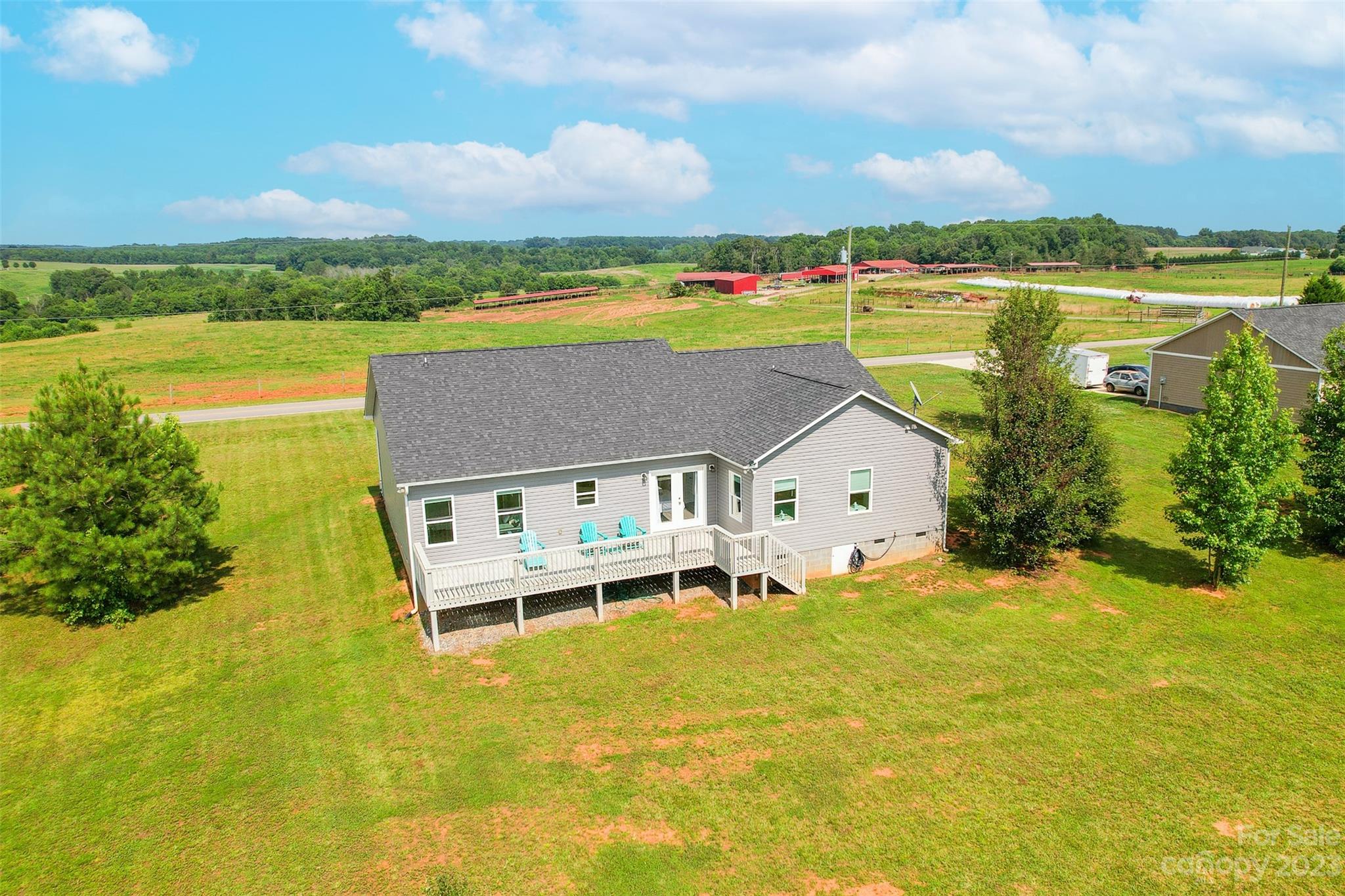 345 Rash Road Olin, NC 28660 - Photo 33 of 39 an aerial view of residential houses with outdoor space and ocean view
