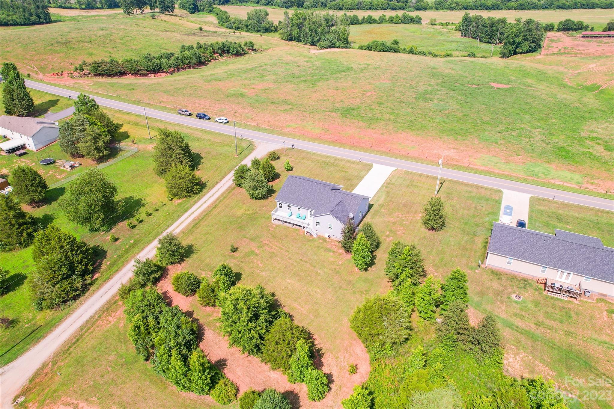 345 Rash Road Olin, NC 28660 - Photo 36 of 39 a view of an swimming pool and outdoor space