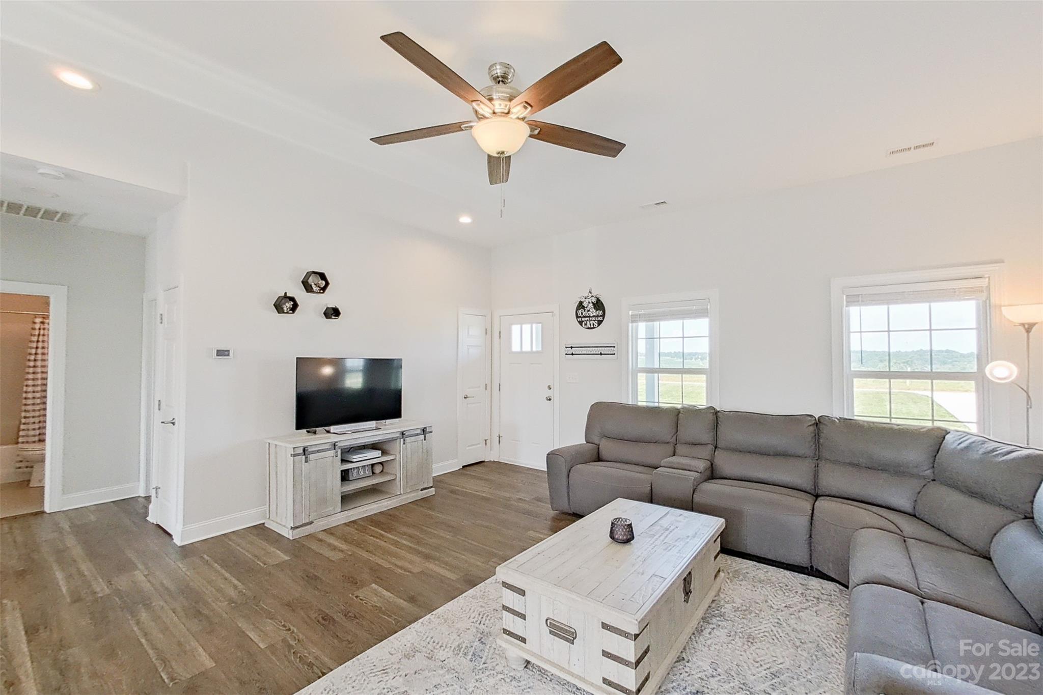 345 Rash Road Olin, NC 28660 - Photo 7 of 39 a living room with furniture and a flat screen tv