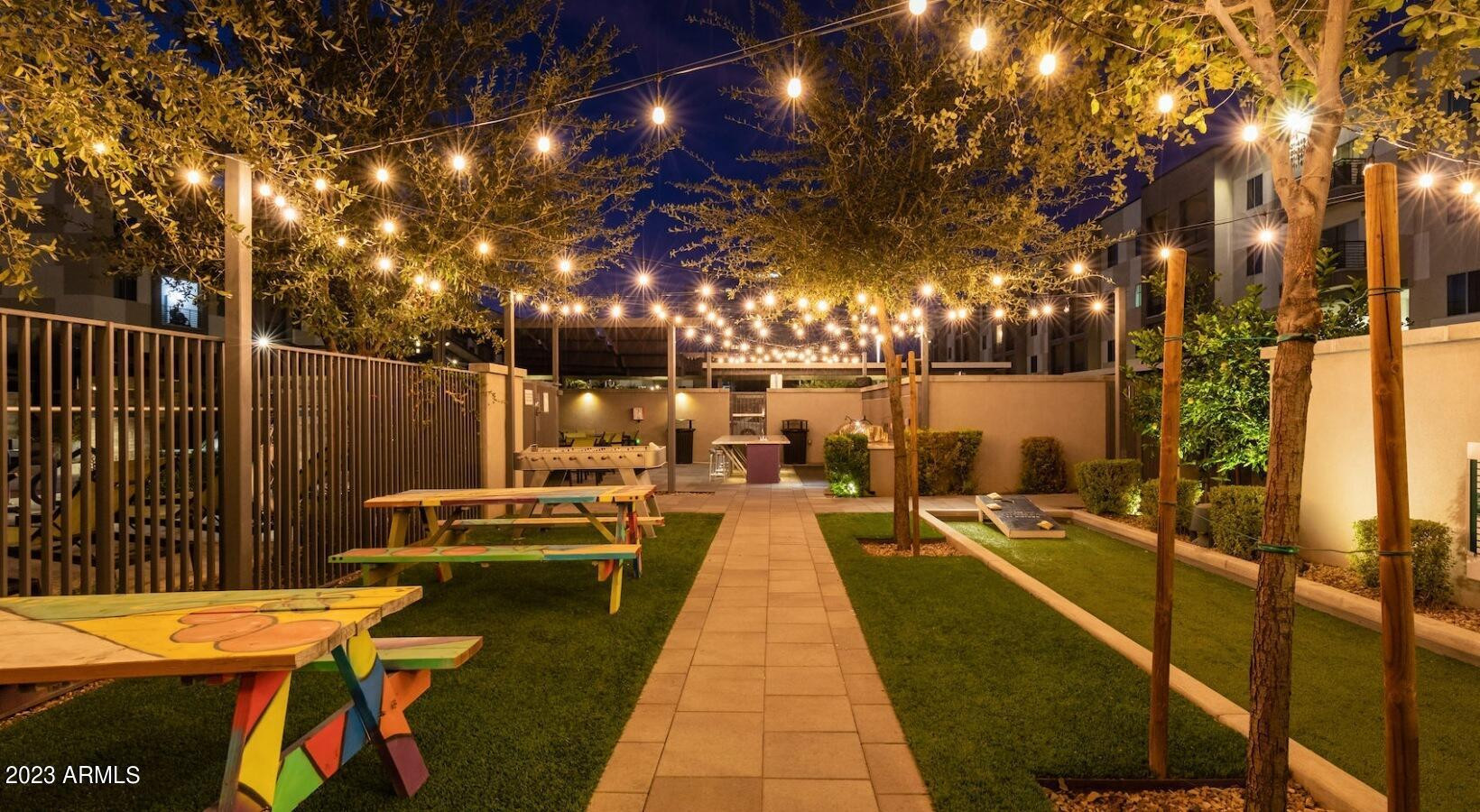200 East Thomas Road, Unit B2 Phoenix, AZ 85012 - Photo 28 of 29 a view of swimming pool with outdoor seating