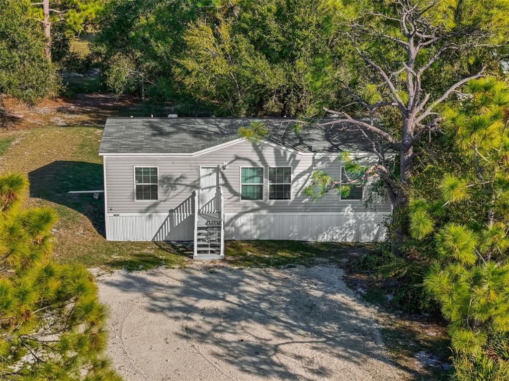 8432 Sweden Boulevard Punta Gorda, FL 33982 - Photo 20 of 23 front view of a house with a yard