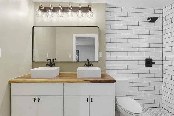 a bathroom with a sink and a toilet