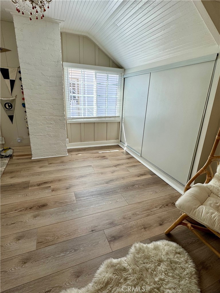 437 Cypress Drive, Unit B Laguna Beach, CA 92651 - Photo 13 of 20 a view of an empty room with a window