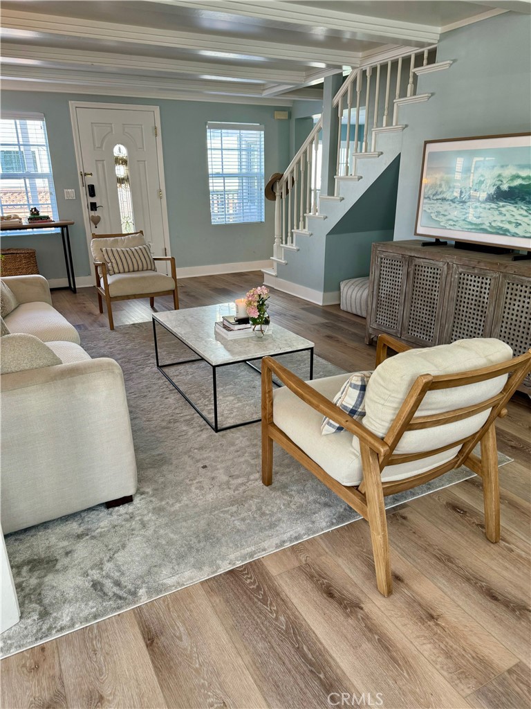 437 Cypress Drive, Unit B Laguna Beach, CA 92651 - Photo 6 of 20 a living room with furniture and a table