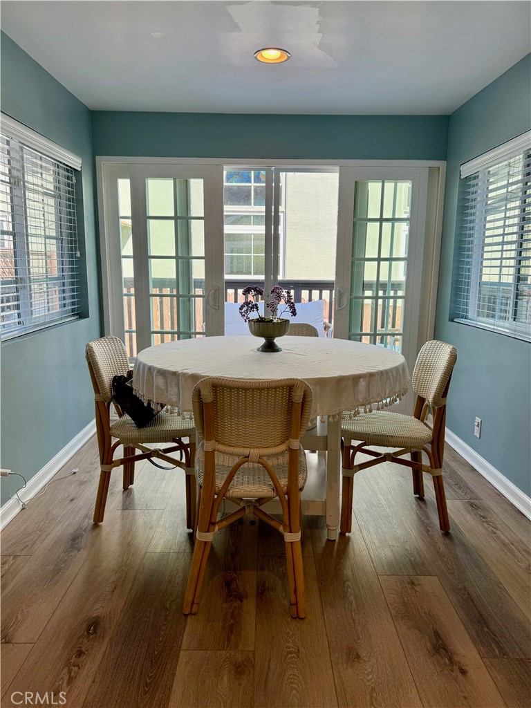 437 Cypress Drive, Unit B Laguna Beach, CA 92651 - Photo 9 of 20 a view of a dining room with furniture window and outside view