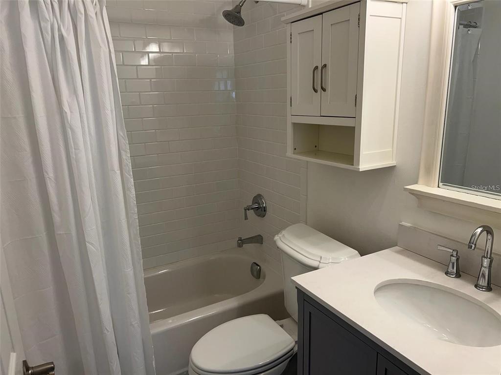 4122 West Empedrado Street Tampa, FL 33629 - Photo 15 of 25 a bathroom with a sink toilet and shower