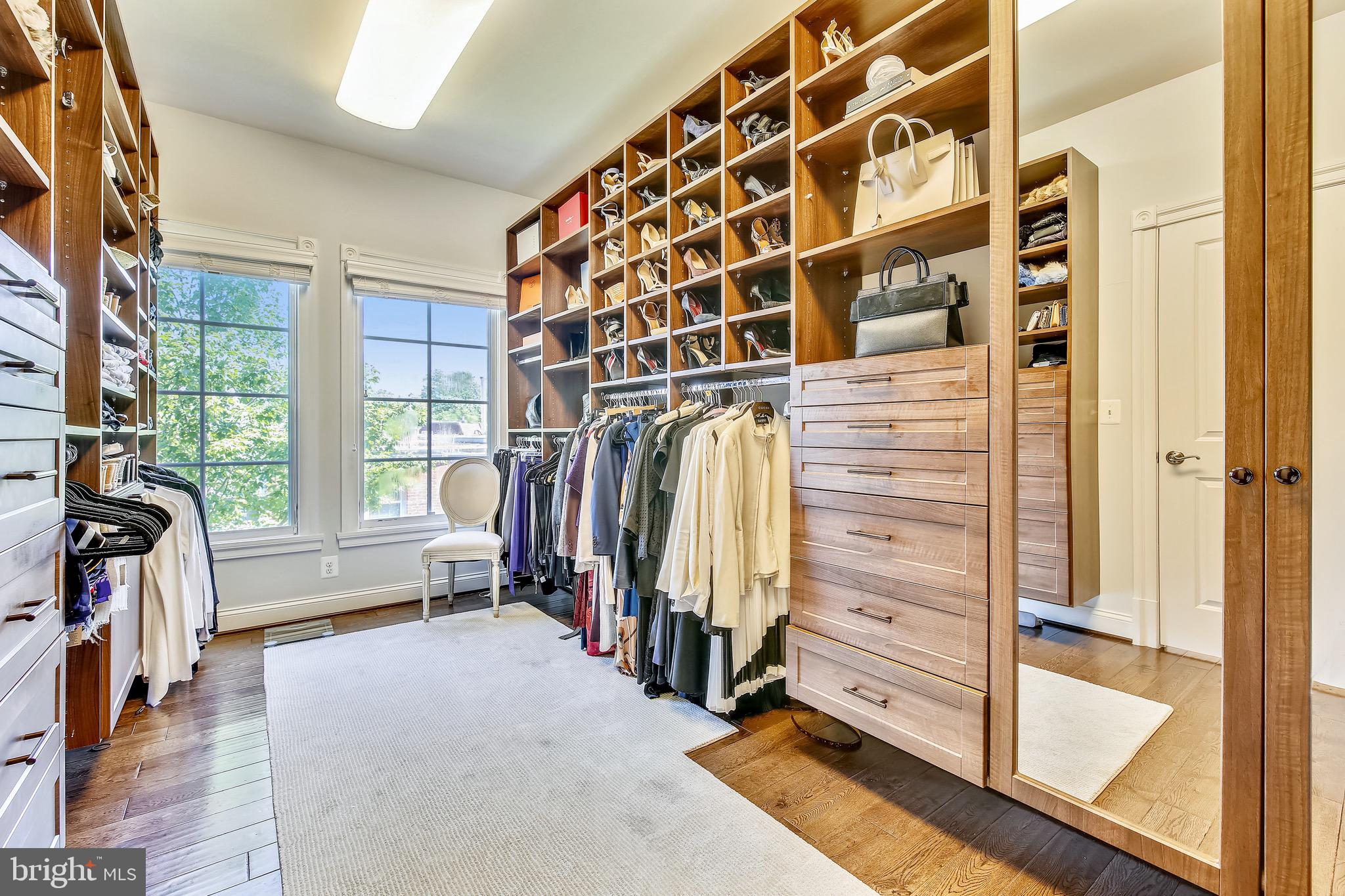 1411 Ridgeview Way Washington, DC 20007 - Photo 20 of 43 a view of walk in closet with clothes and shoes