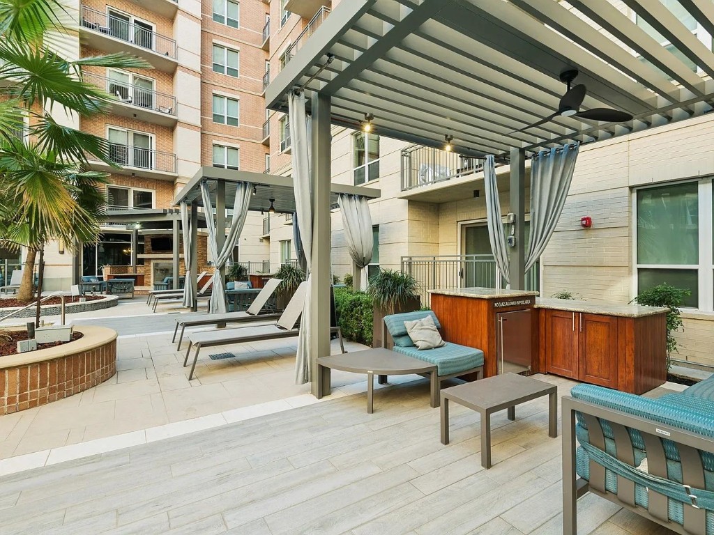 2724 Kipling Street, Unit 308 Houston, TX 77098 - Photo 21 of 29 a building outdoor space with patio furniture