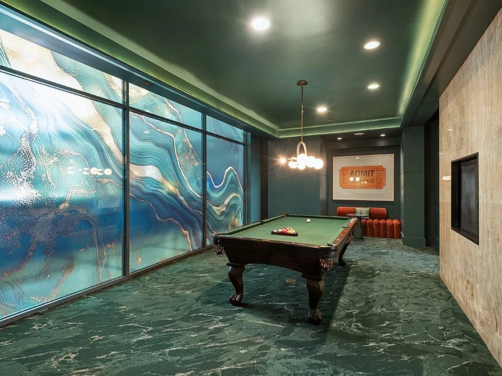 2724 Kipling Street, Unit 308 Houston, TX 77098 - Photo 7 of 29 a room with pool table and flat screen tv