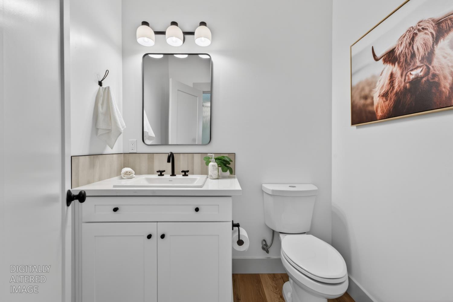 280 Jan Road Grass Valley, CA 95945 - Photo 5 of 66 a bathroom with a toilet sink and mirror
