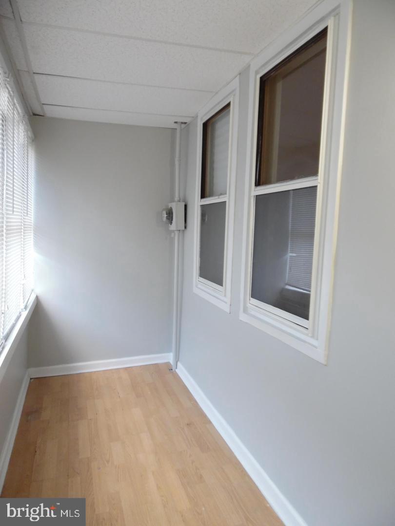 810 Powell Street Gloucester City, NJ 08030 - Photo 13 of 16 a view of an empty room with a window