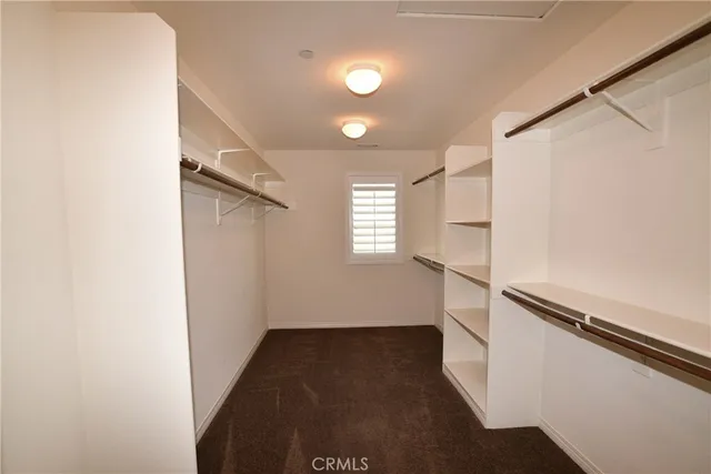 a view of entryway with stairs and wooden floor