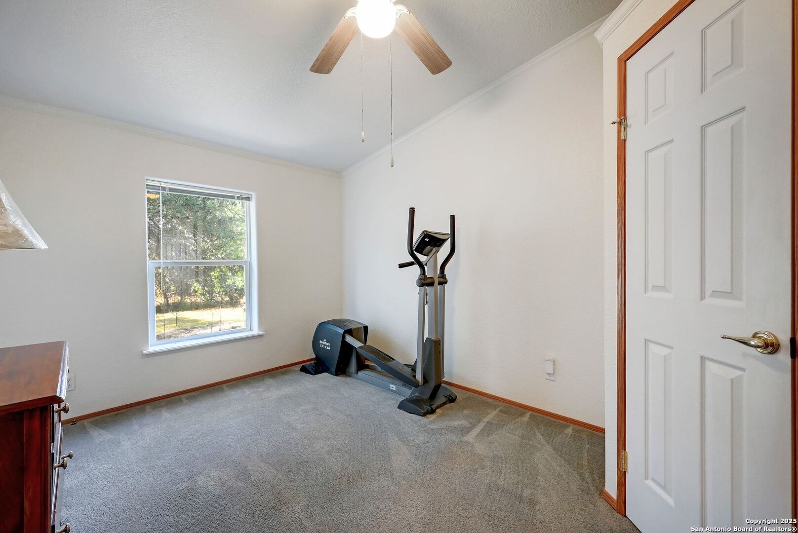 480 Rangeland Road Blanco, TX 78606 - Photo 19 of 26 a view of a room with gym equipment and a window
