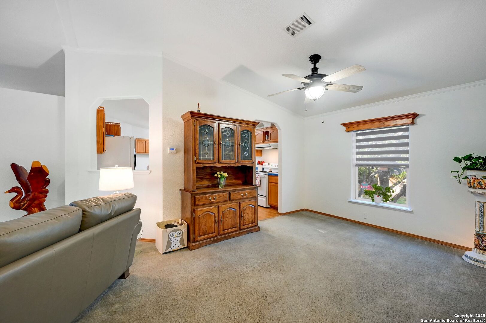 480 Rangeland Road Blanco, TX 78606 - Photo 5 of 26 a living room with furniture and a flat screen tv