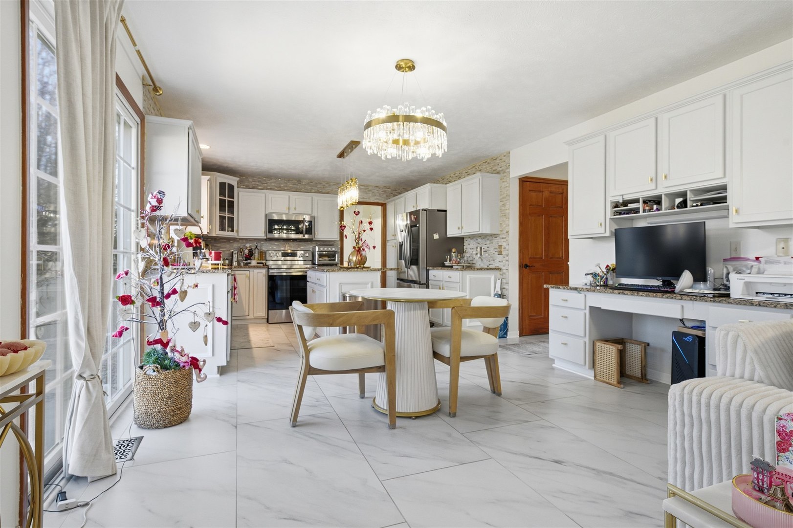 1504 Estate Drive Normal, IL 61761 - Photo 16 of 34 a living room with furniture and flat screen tv