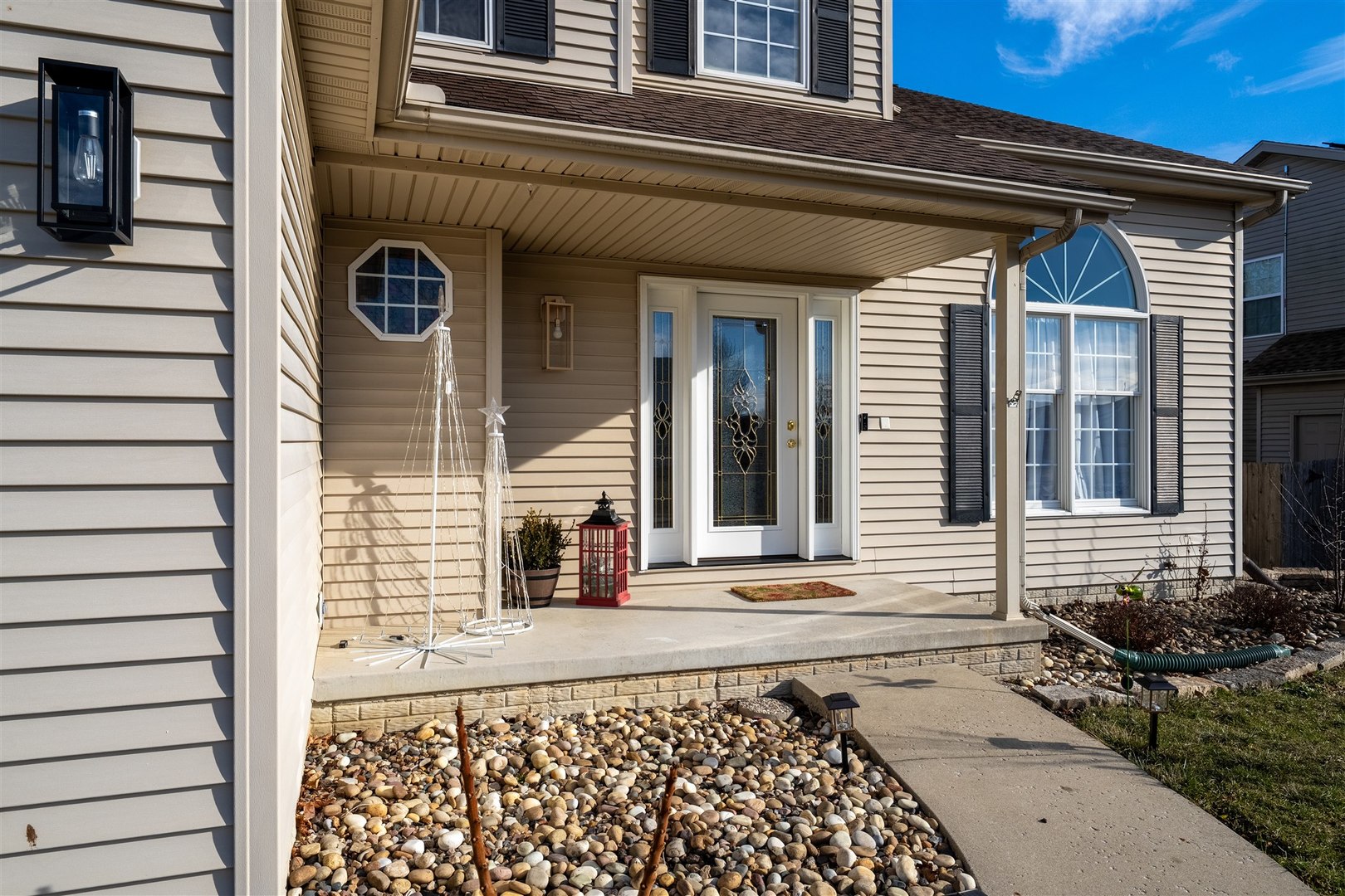 1504 Estate Drive Normal, IL 61761 - Photo 5 of 34 a view of a brick house with potted plants