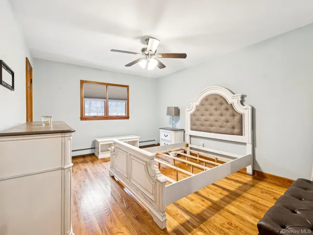 a bedroom with a bed and a table