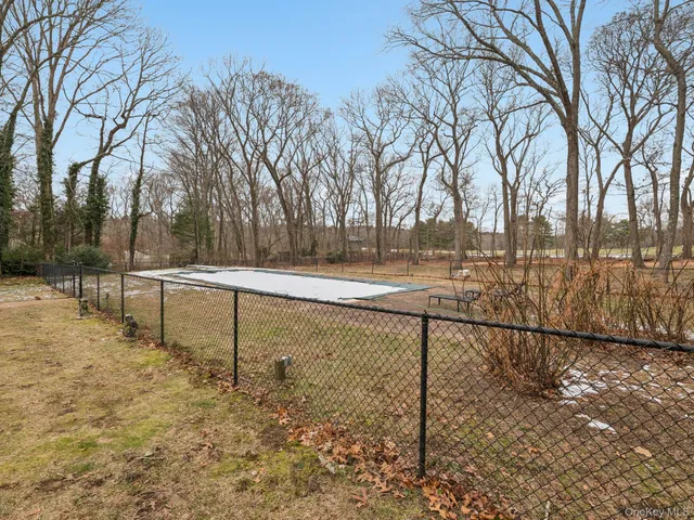 a view of a backyard of the house