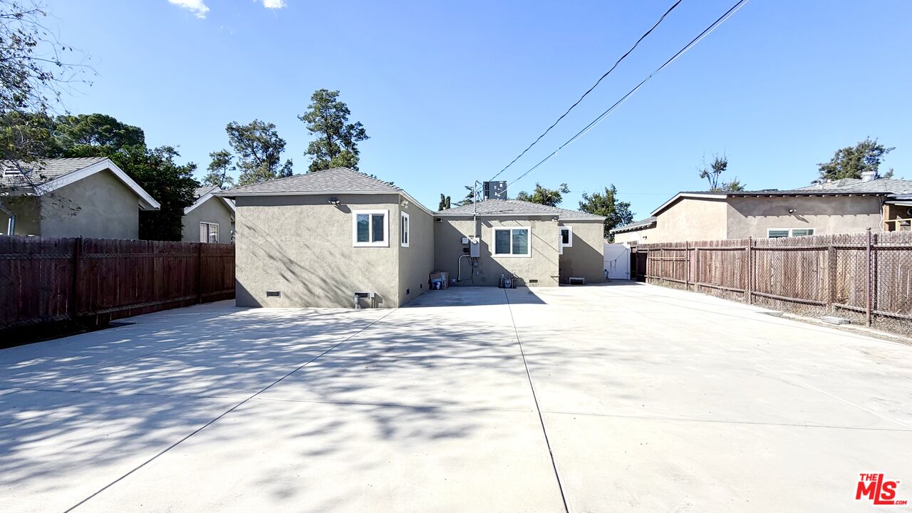 11836 Rialto Street Sun Valley, CA 91352 - Photo 34 of 34 a front view of a house with a yard