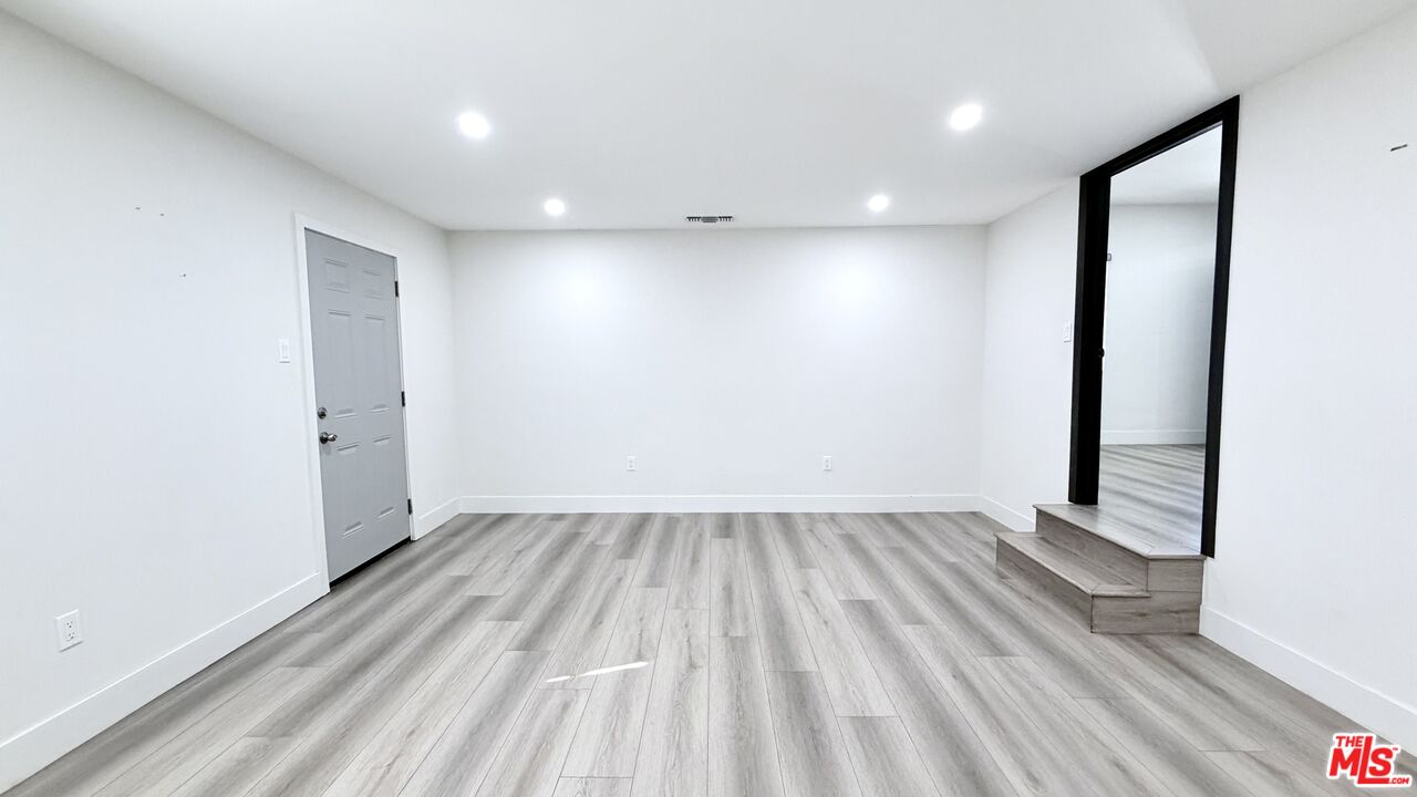 11836 Rialto Street Sun Valley, CA 91352 - Photo 6 of 34 a view of wooden floor in an empty room
