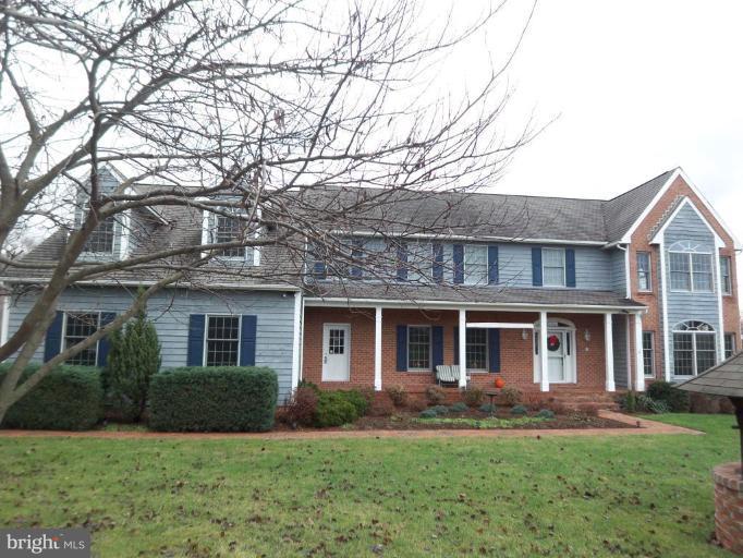 2637 Stockton Road Phoenix, MD 21131 - Photo 1 of 25 front view of a house with a yard