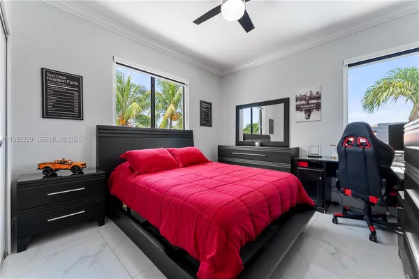 a kitchen with wooden cabinets and stainless steel appliances