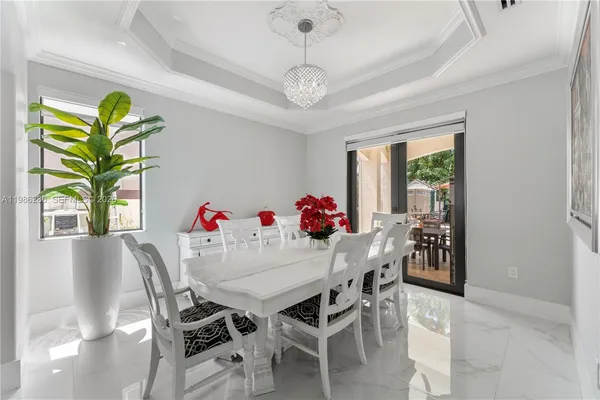 a kitchen with stainless steel appliances kitchen island granite countertop a sink and cabinets