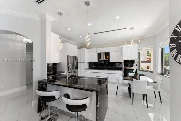 a view of a living room and dining room