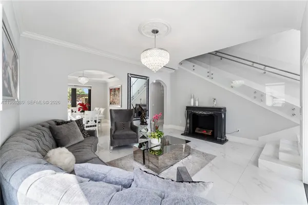 a living room with furniture and a couch