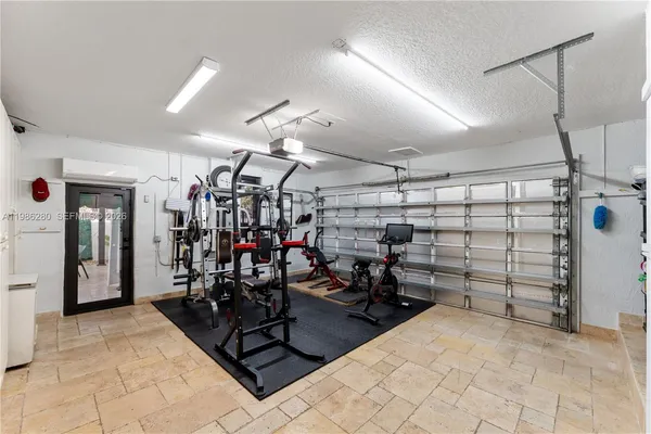 an aerial view of residential houses with city view