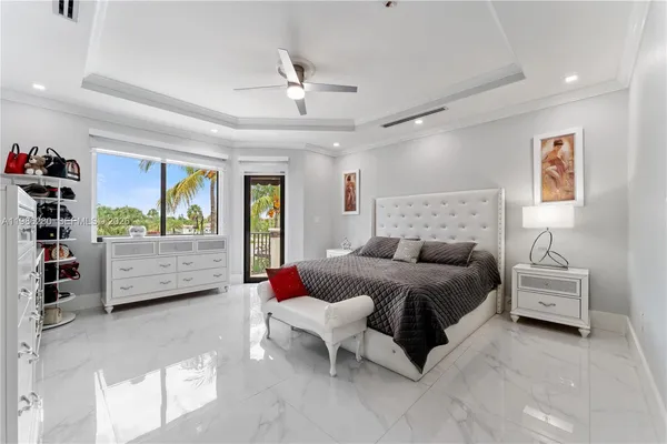 a view of balcony with a palm tree