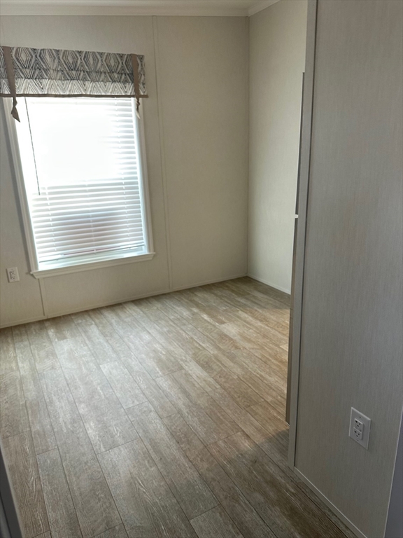 200 North Street Danvers, MA 01923 - Photo 13 of 16 an empty room with wooden floor and windows