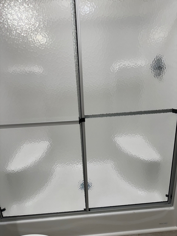 200 North Street Danvers, MA 01923 - Photo 10 of 16 a bathroom with a shower